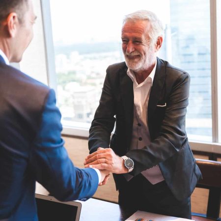 Group of sucessful business person and coworker hand shaking with smile and happy for new start up project at the office conference meeting room